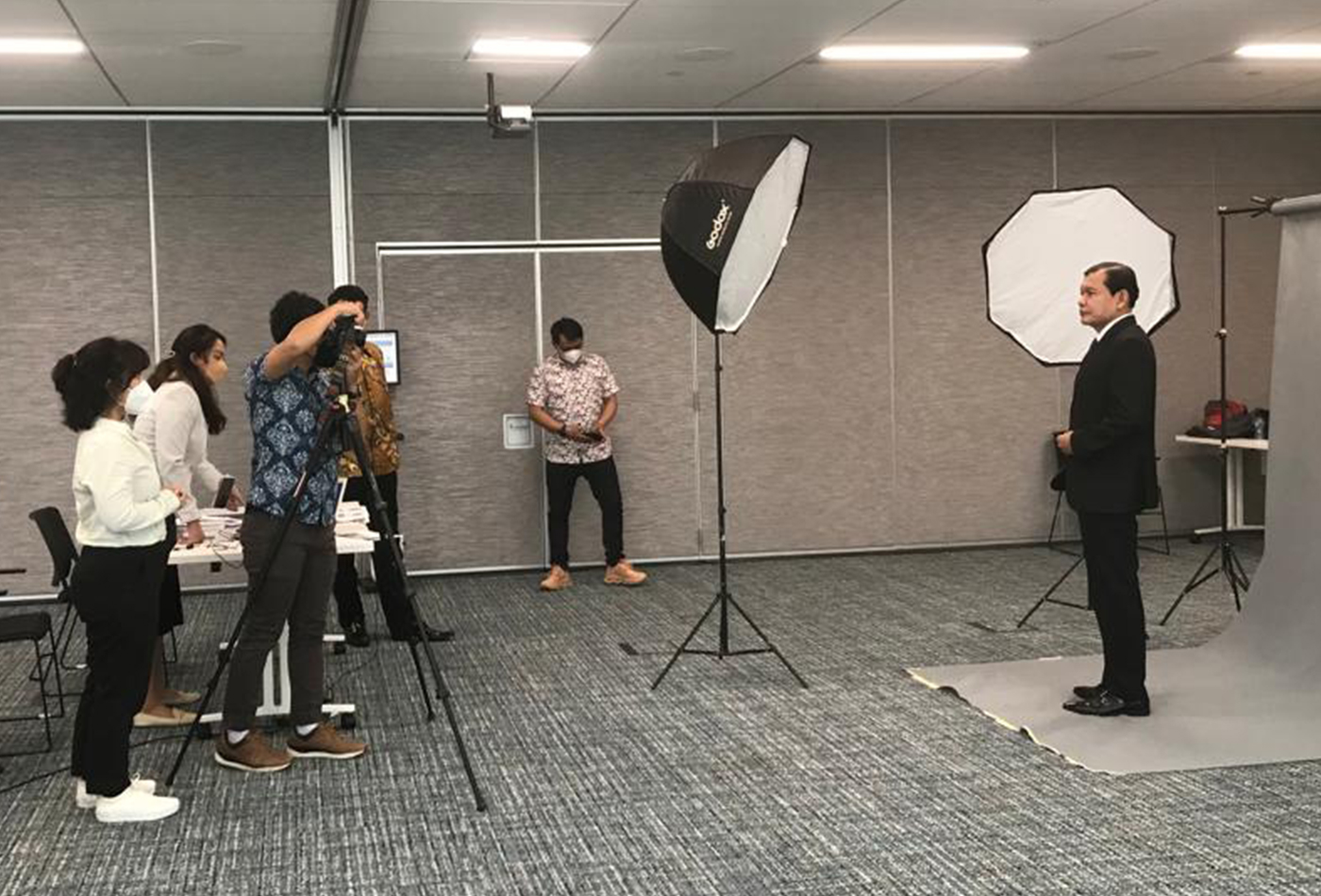 The management photo session for the annual report is part of providing a proper update of corporate information.